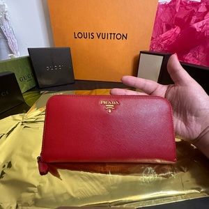 Prada red zippy wallet